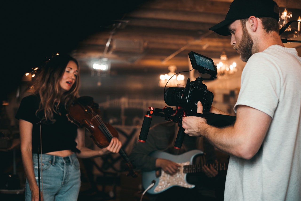 Dato Darren Yaw shooting a woman playing violin